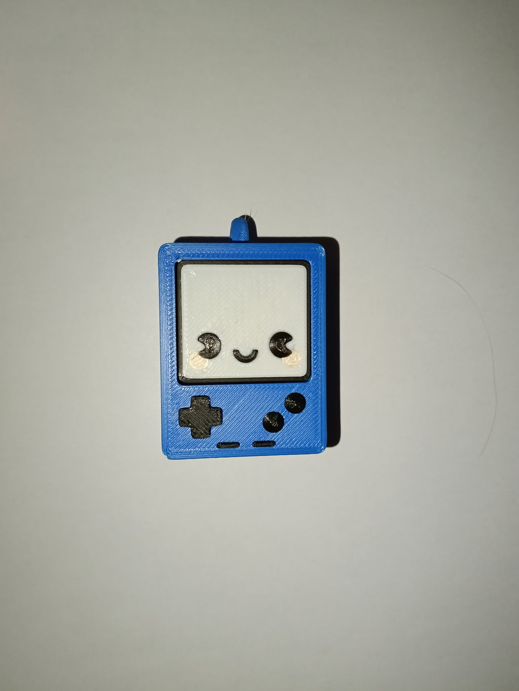 Kliker antystresowy 3D w stylu GameBoy – brelok fidget do zabawy i relaksu