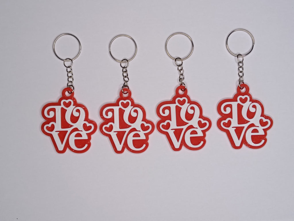 Brelok Love w ozdobnej ramce – czerwono-biały brelok 3D w eleganckim stylu