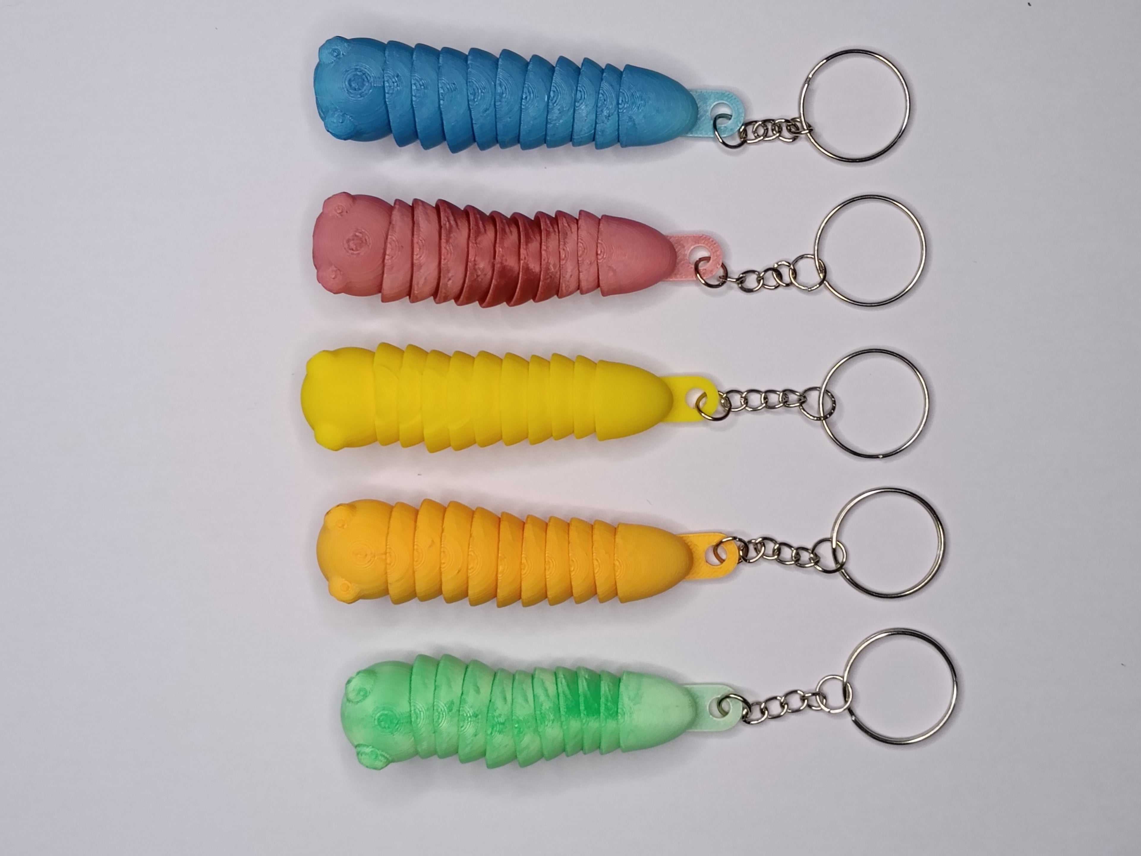 Ruchomy Brelok Robaczek 3D – kolorowy fidget z kolekcji Madi Studio