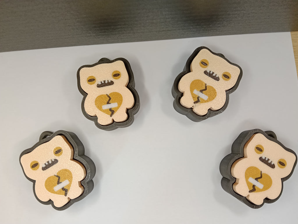 Fuggler Clicker – Antystresowy brelok z pękniętym sercem | Executive Toy