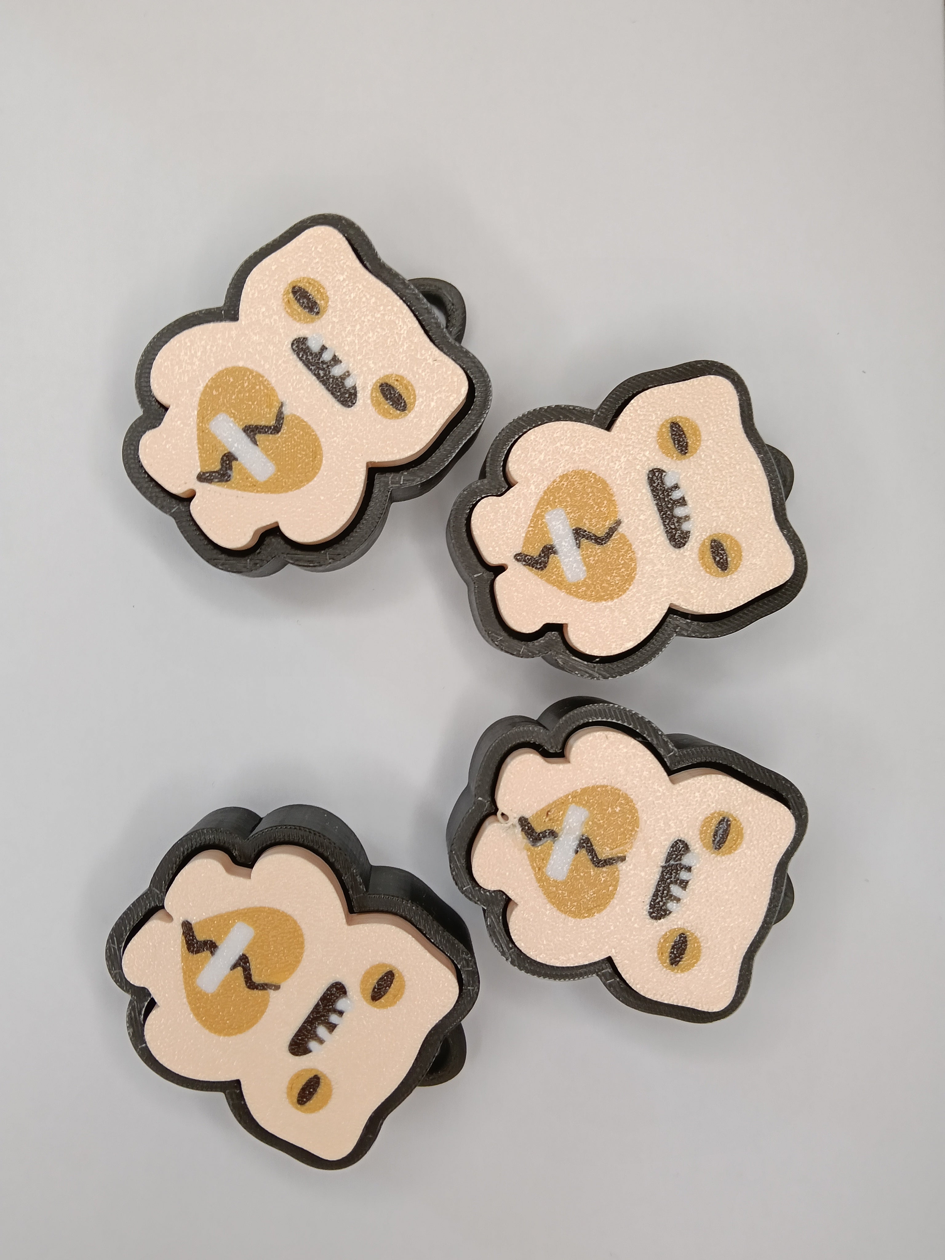 Fuggler Clicker – Antystresowy brelok z pękniętym sercem | Executive Toy