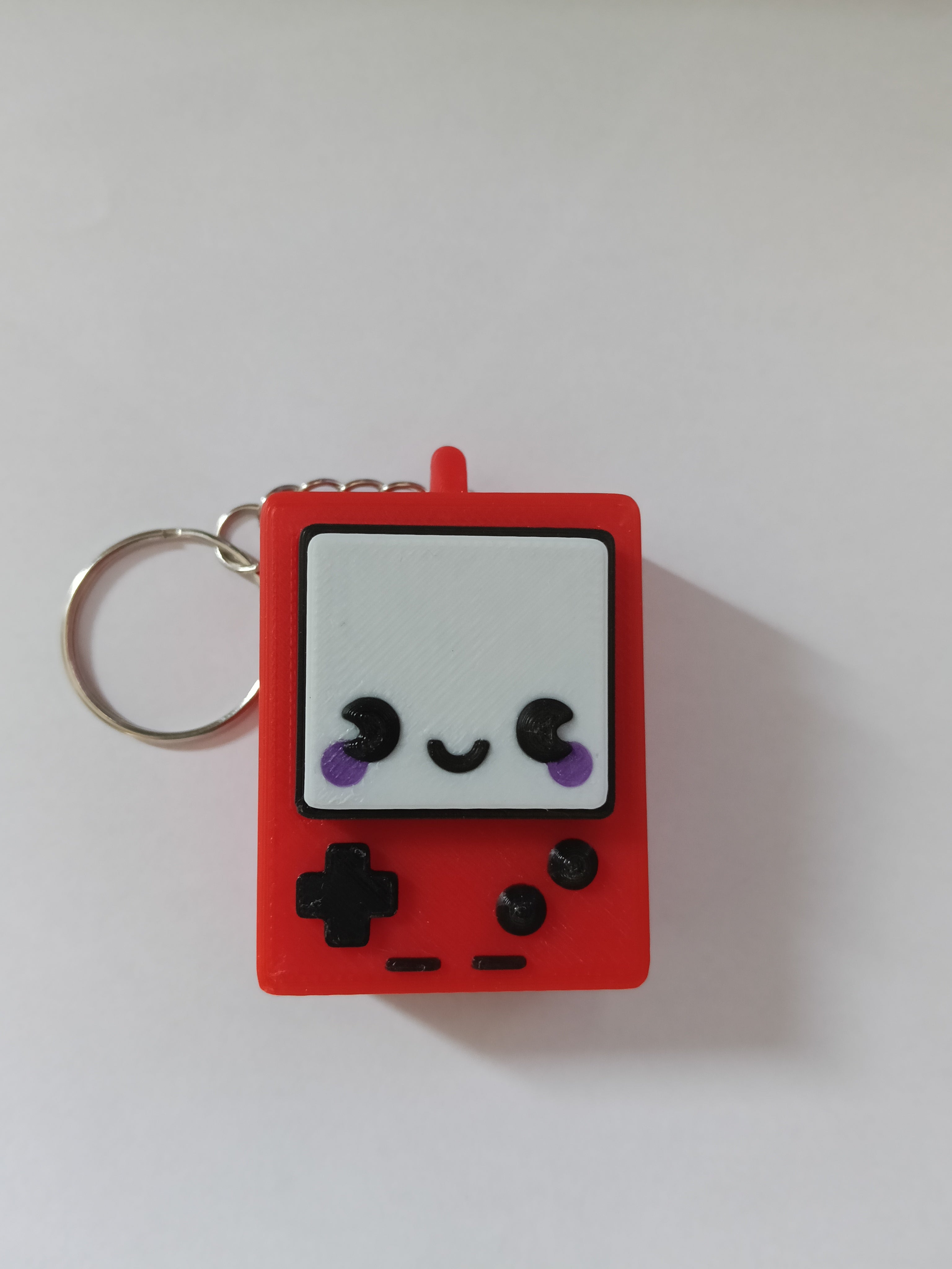 Kliker antystresowy 3D w stylu GameBoy – brelok fidget do zabawy i relaksu