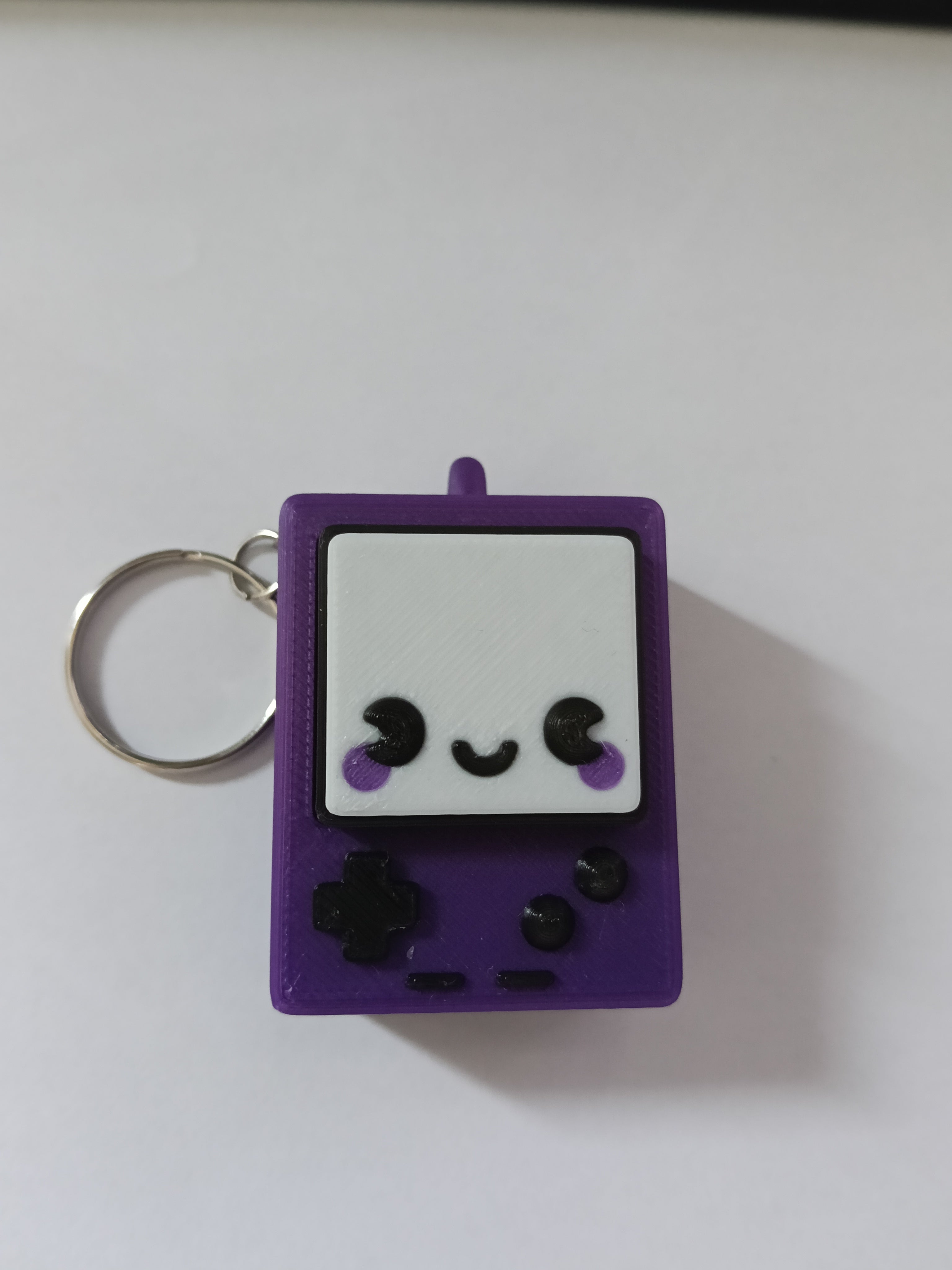 Kliker antystresowy 3D w stylu GameBoy – brelok fidget do zabawy i relaksu