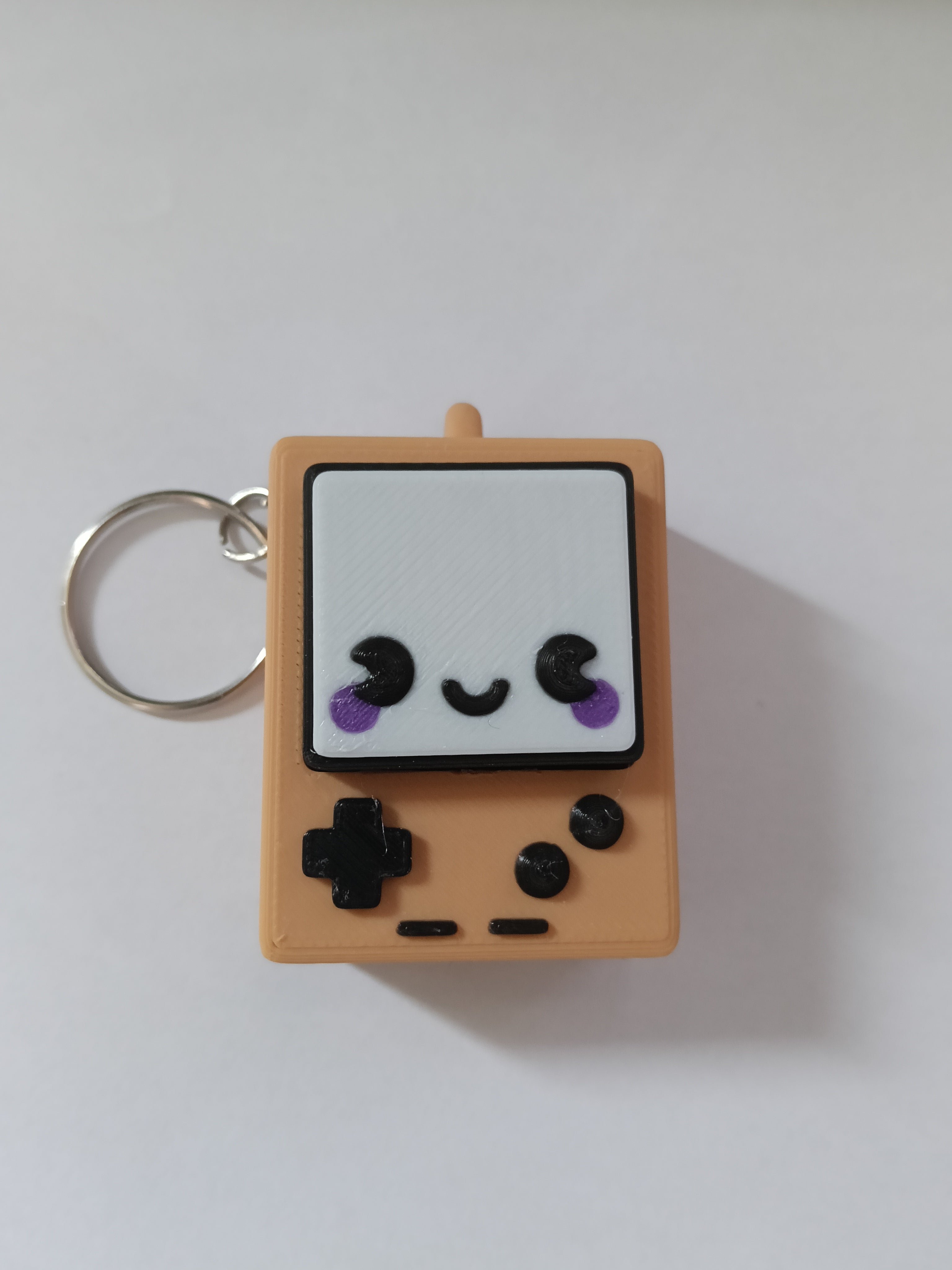 Kliker antystresowy 3D w stylu GameBoy – brelok fidget do zabawy i relaksu