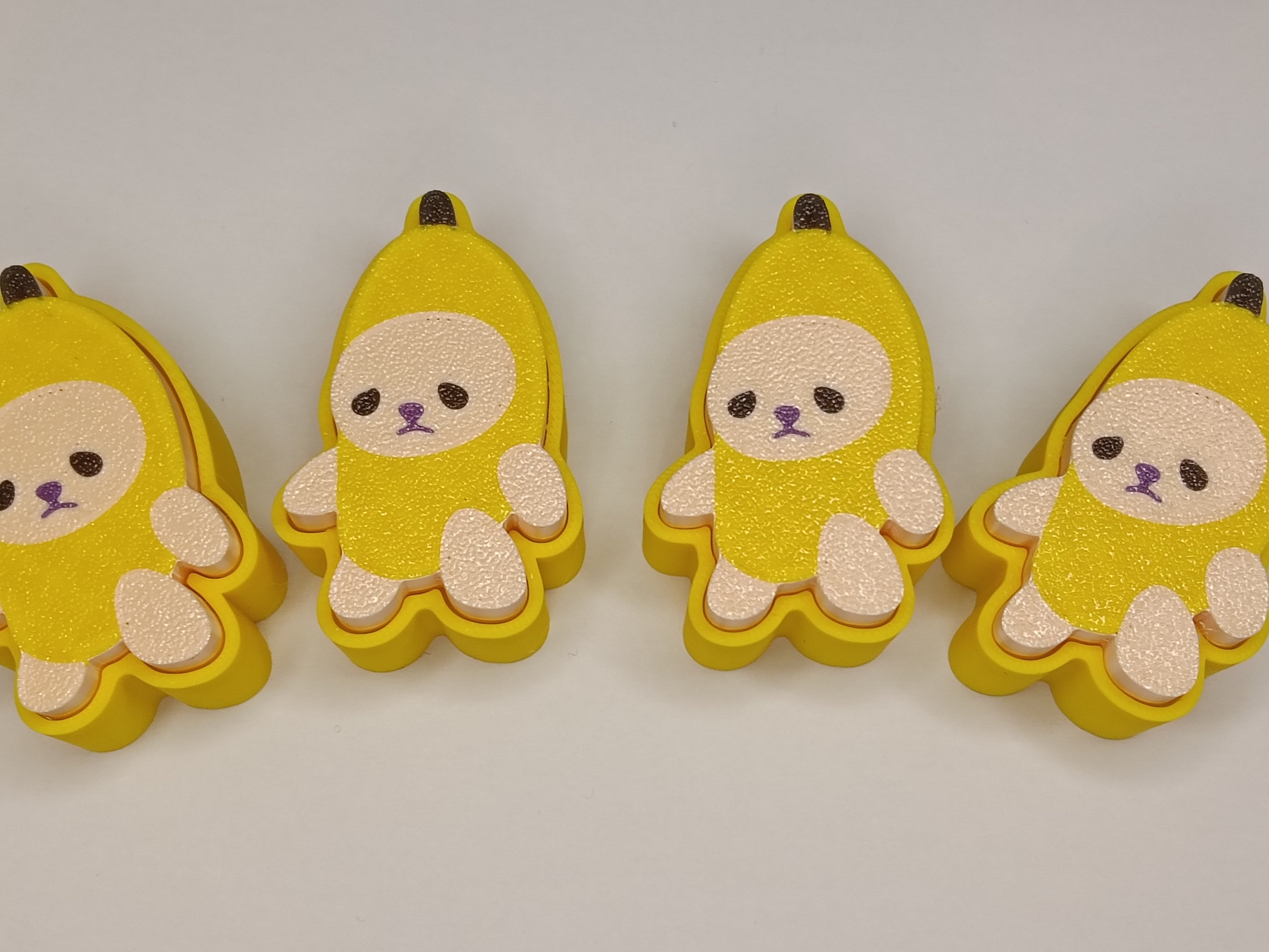 Kliker Antystresowy Brelok – Kot w Kostiumie Banana 🍌🐱